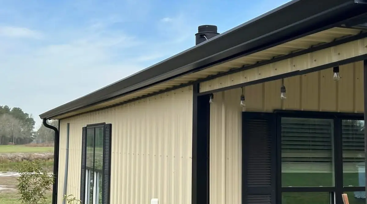 Seamless gutters installed on metal building in South Carolina